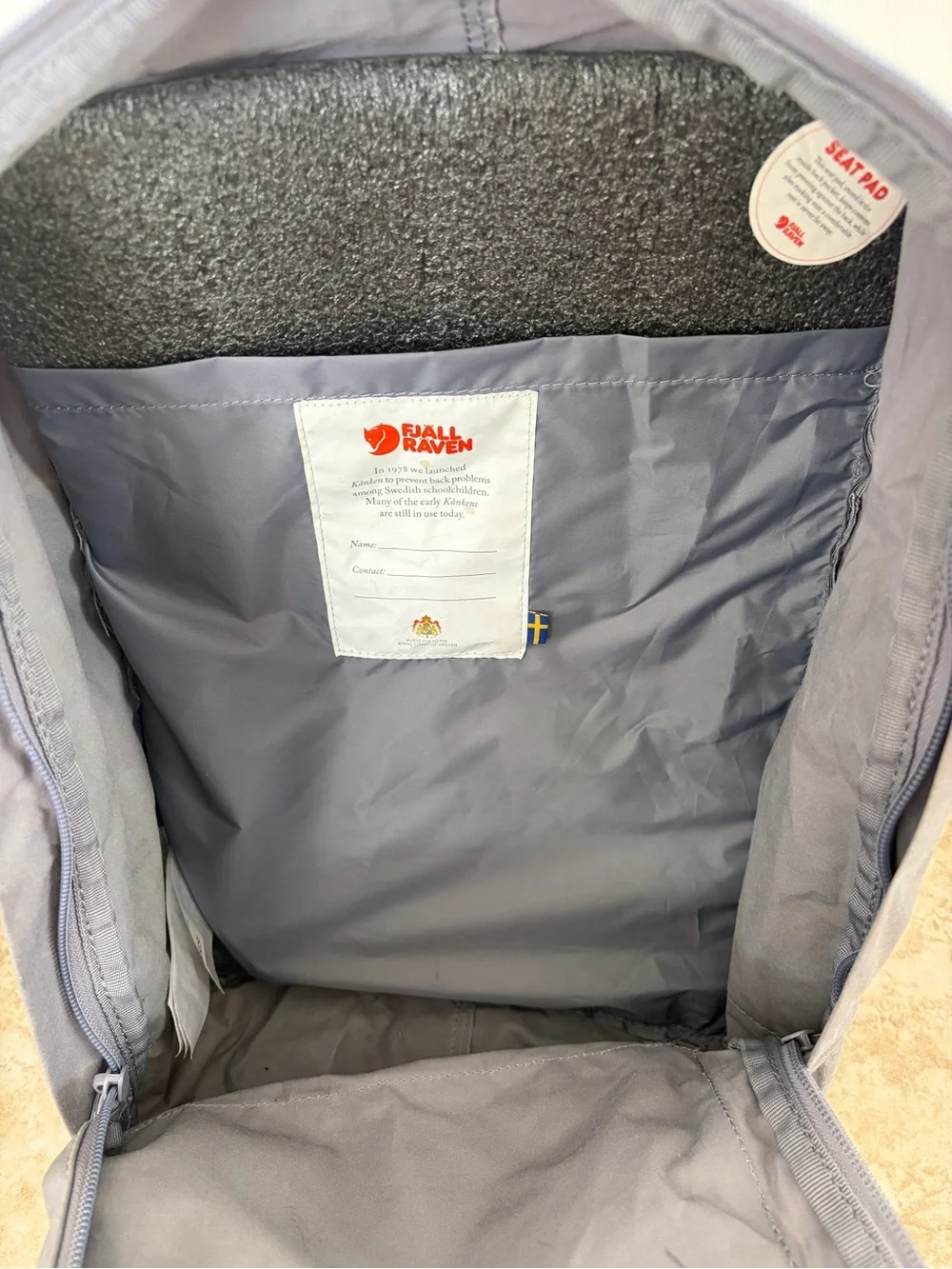 Fjallraven Kanken Backpack in Gray with Red Logo